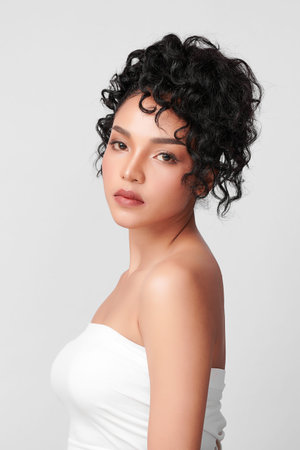 Beautiful young asian woman with clean fresh skin on white background, Face care, Facial treatment, Cosmetology, beauty and spa, Asian women portrait.の写真素材