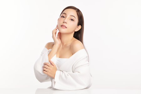 Beautiful young asian woman with clean fresh skin on white background, Face care, Facial treatment, Cosmetology, beauty and spa, Asian women portrait.の写真素材