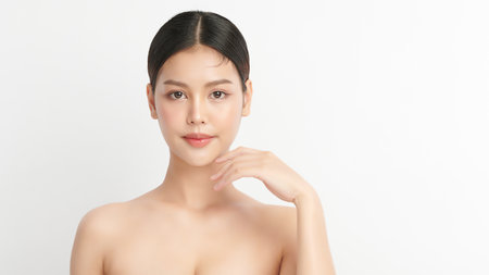 Beautiful young asian woman with clean fresh skin on white background, Face care, Facial treatment, Cosmetology, beauty and spa, Asian women portrait.の写真素材