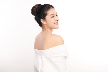 Beautiful young asian woman with clean fresh skin on white background, Face care, Facial treatment, Cosmetology, beauty and spa, Asian women portrait.の写真素材