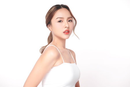 Beautiful young asian woman with clean fresh skin on white background, Face care, Facial treatment, Cosmetology, beauty and spa, Asian women portrait.の写真素材