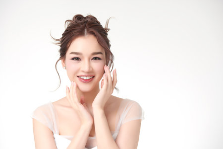 Beautiful young asian woman with clean fresh skin on white background, Face care, Facial treatment, Cosmetology, beauty and spa, Asian women portrait.の写真素材