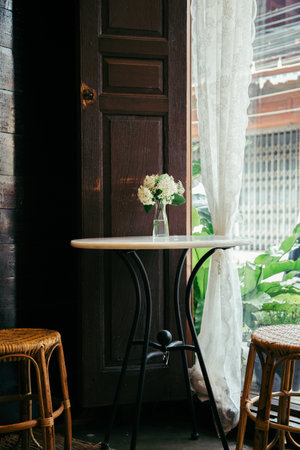 Interior of a cafe with tables and chairs. Vintage style.の写真素材