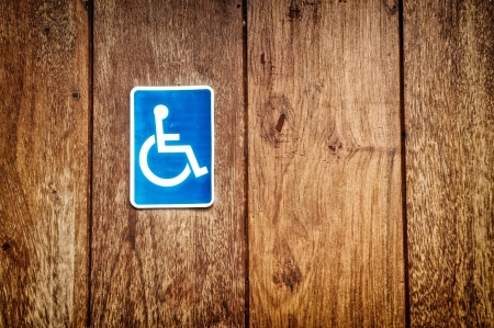 handicap sign on wooden backgroundの写真素材