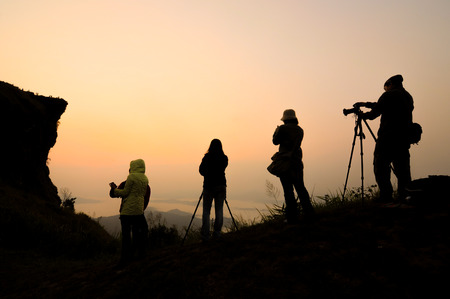 Silhouette of photography at  sunrise. Phu Chi Fa in Chiang Rai Province, Thailand.の写真素材