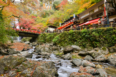 OSAKA, JAPAN -NOVEMBER 26, 2013: Mino waterfall full of tourists take photo in Autumn season Red Maple Leaf Fall Foliage, Minoo (Minoh or Mino) it is one of the best places in the Kansai, Osaka prefecture, Japanのeditorial素材