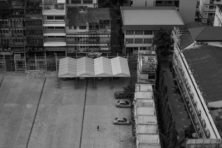 Girl walk alone in car park.の写真素材