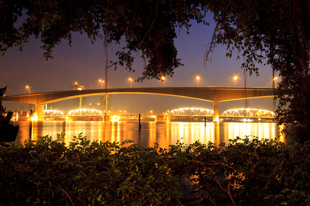 The view from the garden to the bridge at night .の写真素材