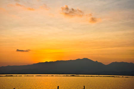 Mountains and sea - sunsetの写真素材