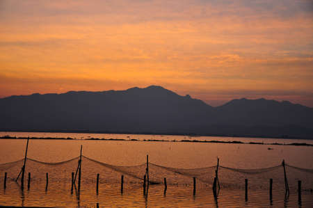 Mountains and sea - sunsetの写真素材
