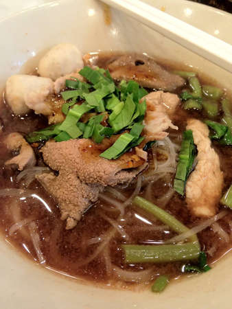 Noodles soup serve with slice beefの写真素材