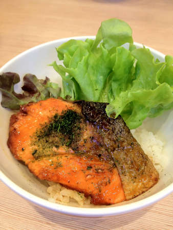 Salmon fillet grilled on a cedar plankの写真素材