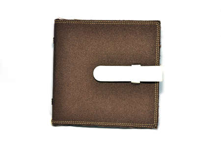 A slightly scuffed book cover with a linen textured binding の写真素材