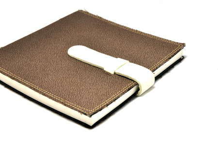 A slightly scuffed book cover with a linen textured binding の写真素材