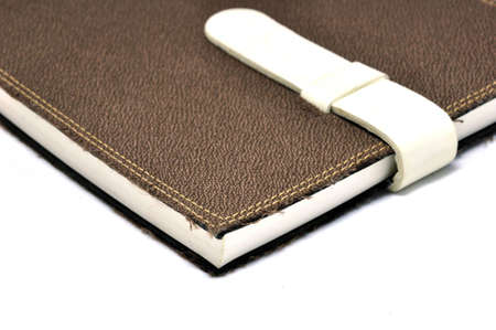 A slightly scuffed book cover with a linen textured binding の写真素材