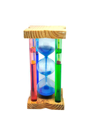 Hourglass colorful shot on mood lighting with white backgroundの写真素材