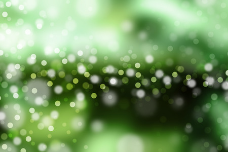 Green filtered bokeh abstract background.の写真素材