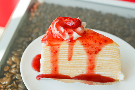 strawberry sauce on crape cakeの写真素材