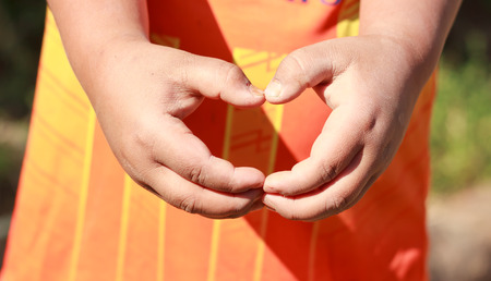 Asia boy make hand in heart form love.の写真素材