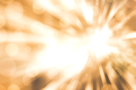 Abstract yellow-gold tone lights background. Blurred background.の写真素材