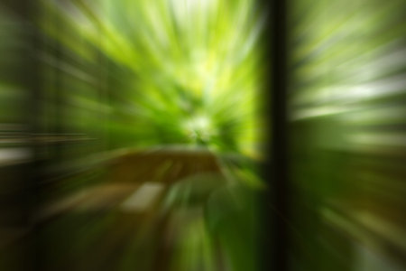 Green filtered bokeh abstract background.