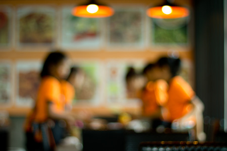 Coffee shop blur background with bokeh image .の写真素材
