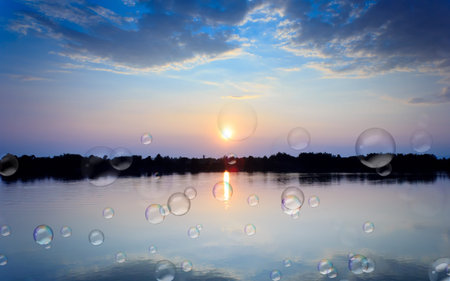 sopa suds on Gold light on sun set with light on the river background.の写真素材