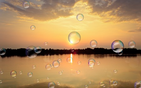 Gold light on sun set with light on the river.の写真素材