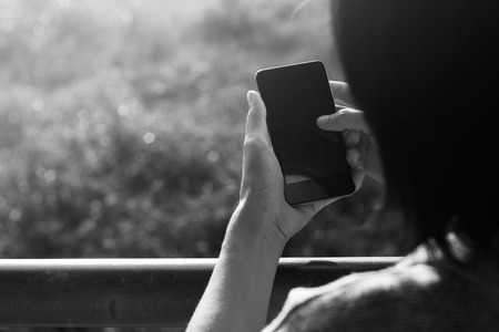 Woman using smart phone.の写真素材