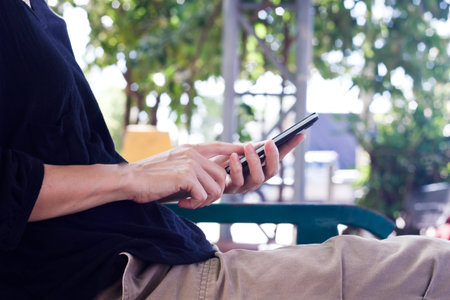 Woman using smart phone.