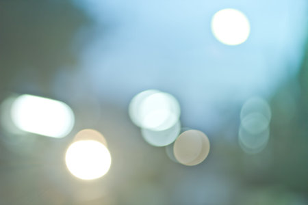 Defocused city night filtered bokeh abstract background.