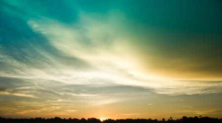 Gold light on sun set with light on the river.Idyllic Wallpaper Setting Sun.の写真素材