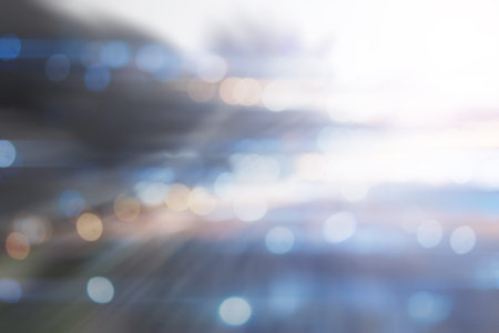 Defocused city night filtered bokeh abstract background.