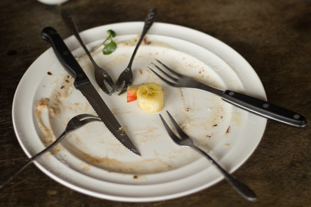 Empty disk after eat and it's dirty.の写真素材