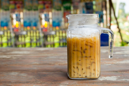 Iced coffee in a tall glass.の写真素材