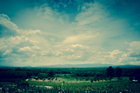 Filterred vintage tone of Blue sky background with rainy cloudy in poor lighting day.の写真素材