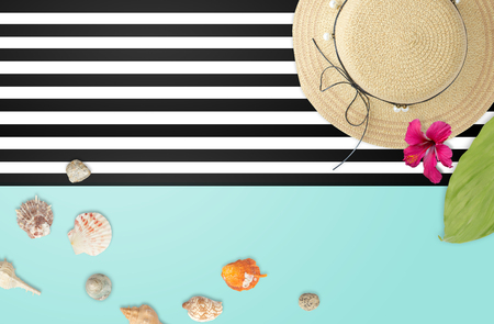 Beach accessories  with tropical leaves frame. Summer beach concept.の写真素材