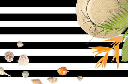 Beach accessories  with tropical leaves frame. Summer beach concept.の写真素材