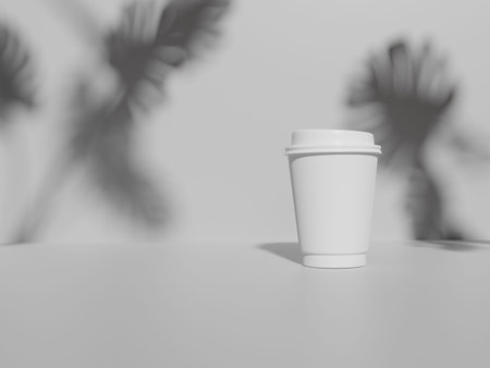 Paper coffee cup mock-up with Monstera leaves shadow on white background. 3D rendering.の写真素材