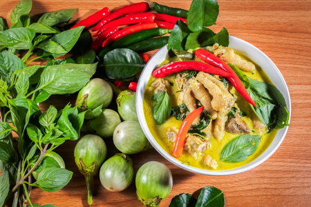 Green Curry Chickenon on a wooden tableの写真素材