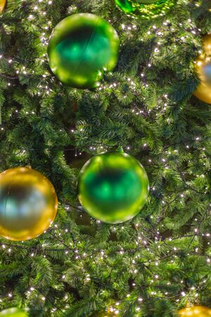 Decorative light background and pine cones For christmasの写真素材