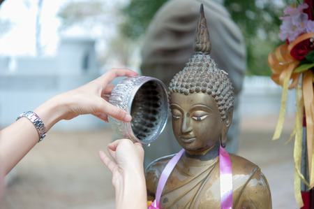 bathing rite for Buddhaの写真素材