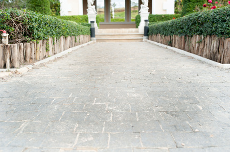 brick pathway in garden exterior selective focusの写真素材