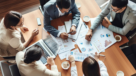 group of people discussing in minute meeting presentation at a conference in a friendly atmosphere in a modern office.の素材