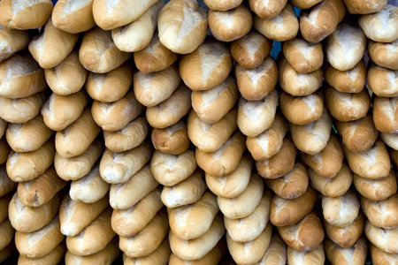 A lot of baguette for sell at morning market in Laos 