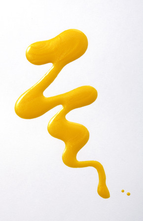 Yellow color abstract shape nail varnishの写真素材