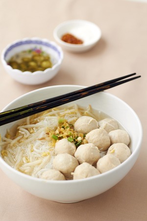 White noodle soup with pork ballの写真素材