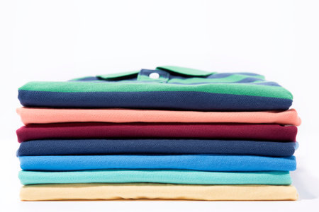 Stack of colourful t-shirtの写真素材