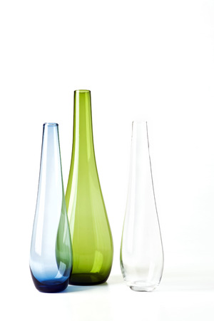 Three colorful jars on backgroundの写真素材