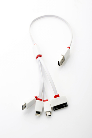 Universal mobile charger cord on backgroundの写真素材